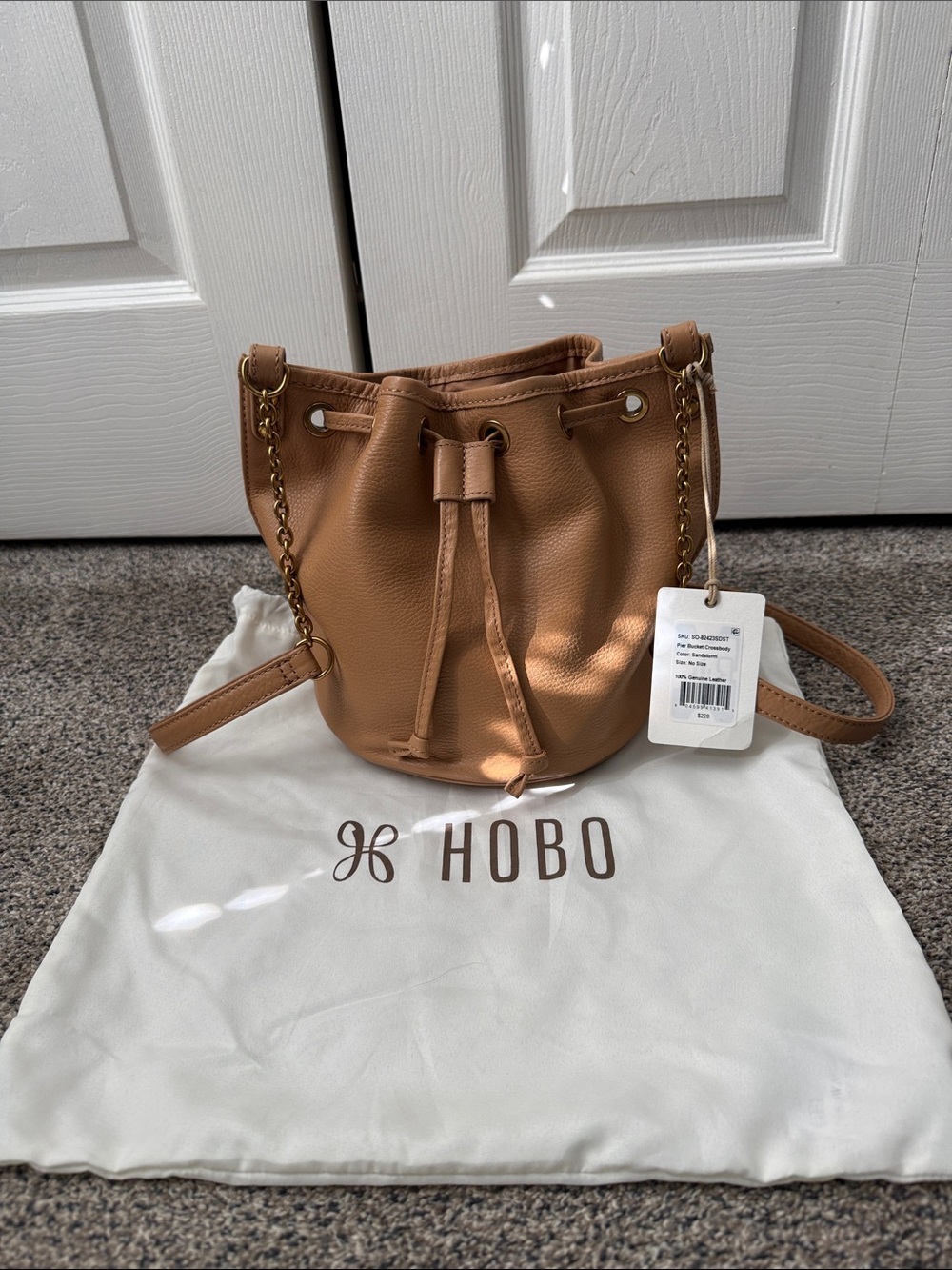 HOBO Tan Leather Drawstring Bucket Bag with Gold Chain Detail